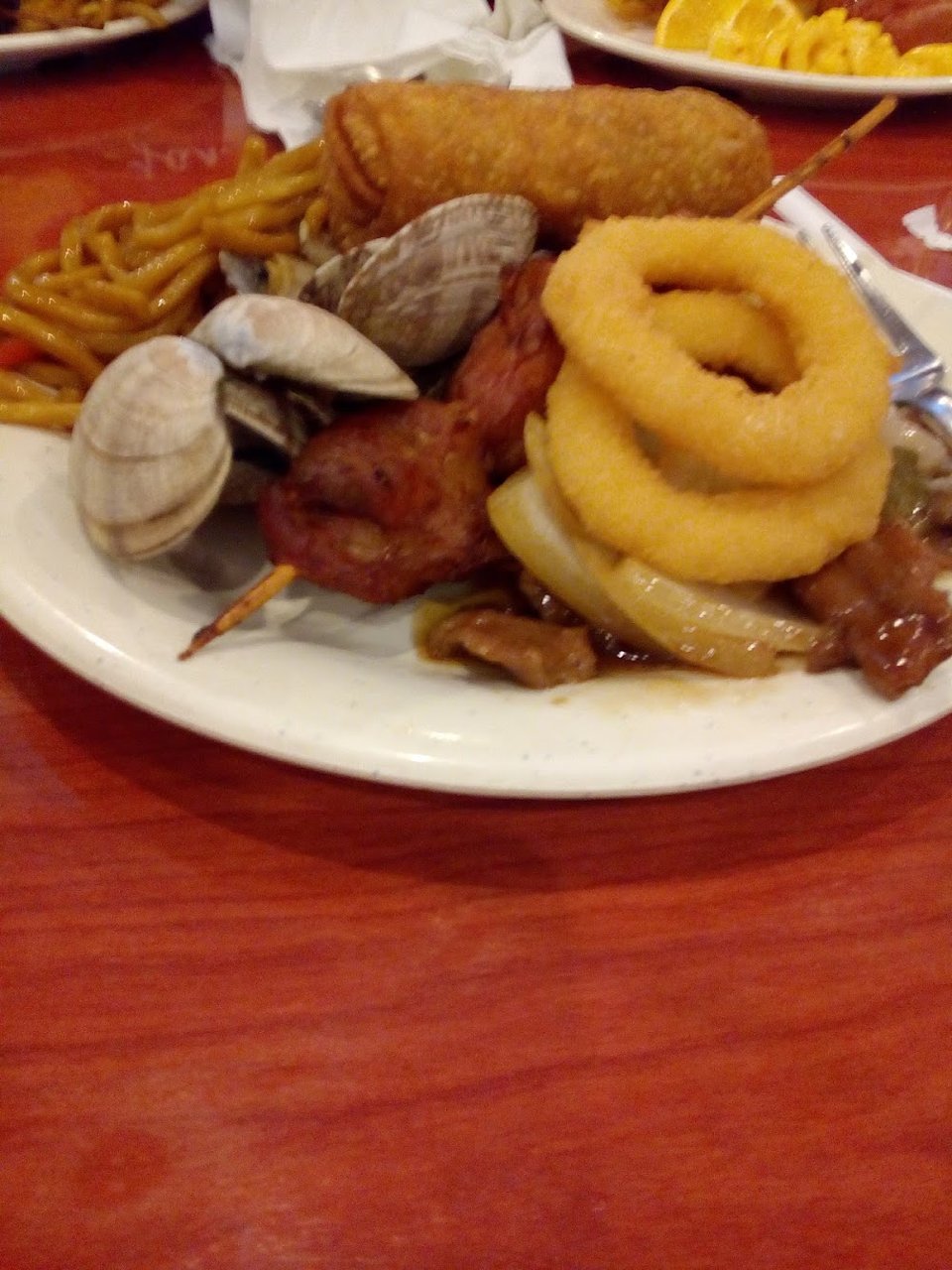 Fresh hot dishes displayed for buffet dining.